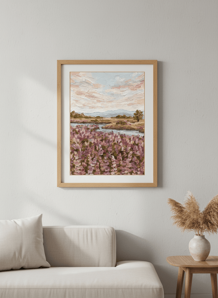 Modern wall art styled above a sofa in a neutral living room