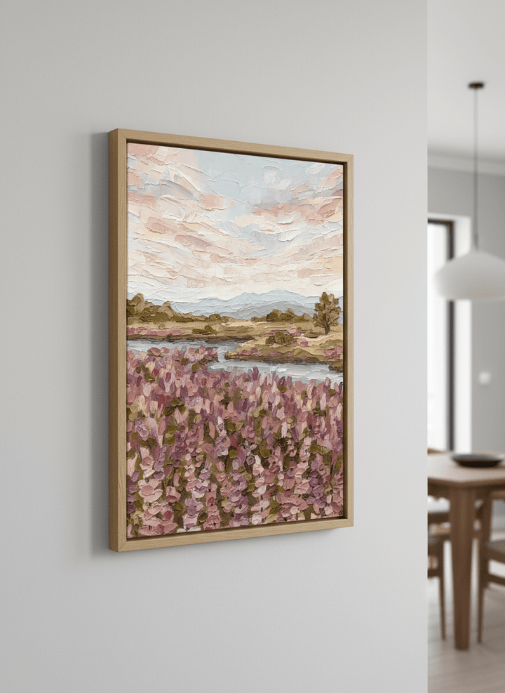 Wall art styled above a dining table in a contemporary home