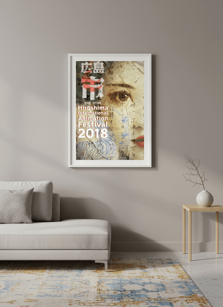 Modern wall art styled above a sofa in a neutral living room