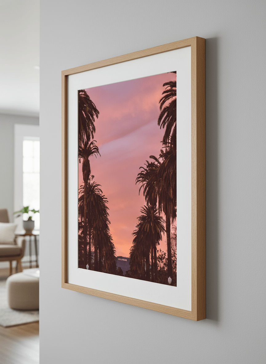 Modern wall art styled above a sofa in a neutral living room