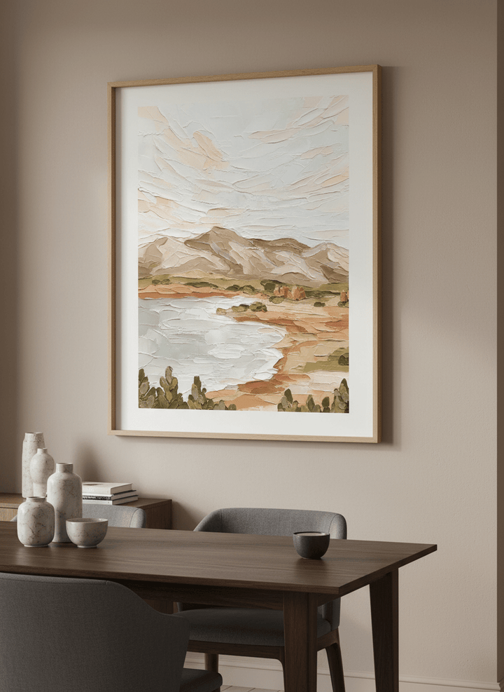 Wall art styled above a dining table in a contemporary home