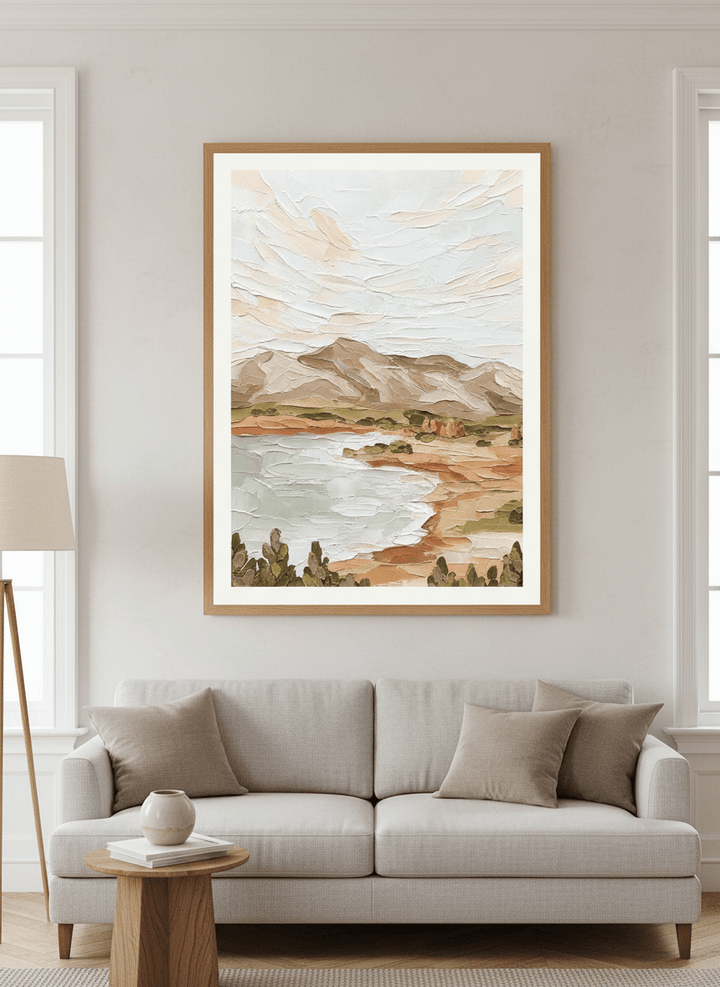 Modern wall art styled above a sofa in a neutral living room
