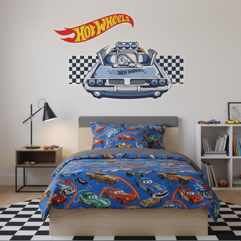 Bedroom with Hot Wheels theme, including bedding, wall decal, and toys.