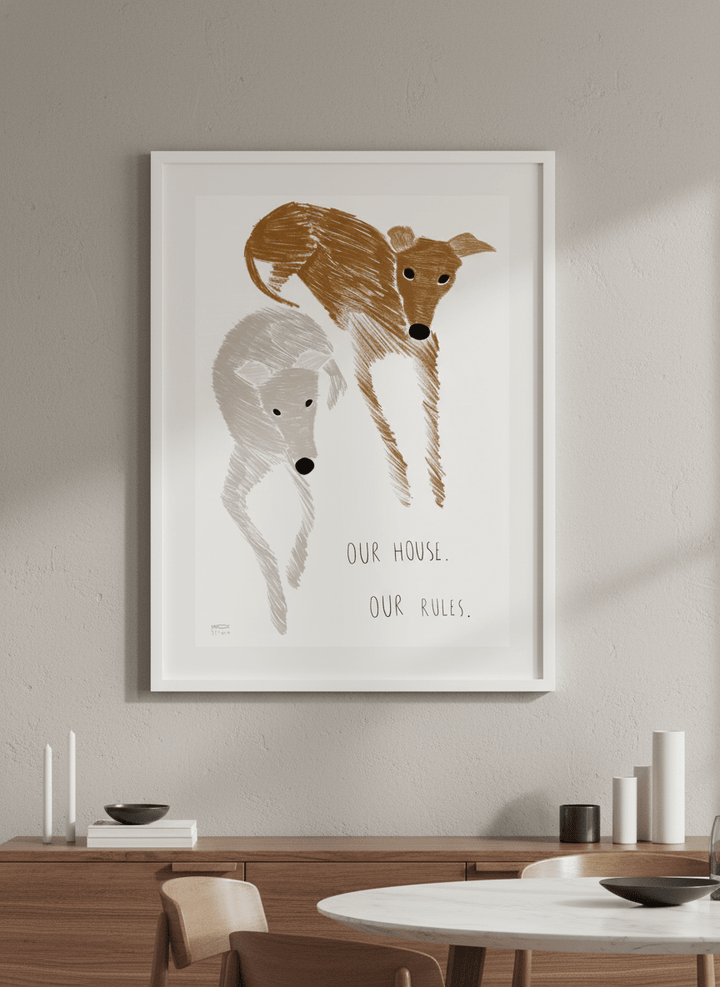 Wall art styled above a dining table in a contemporary home