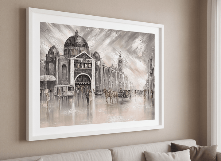 Modern wall art styled above a sofa in a neutral living room