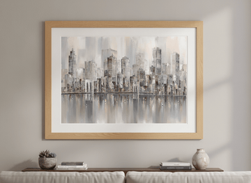 Modern wall art styled above a sofa in a neutral living room