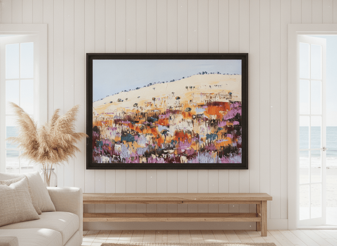 Neutral wall art displayed in a sunny coastal beach house