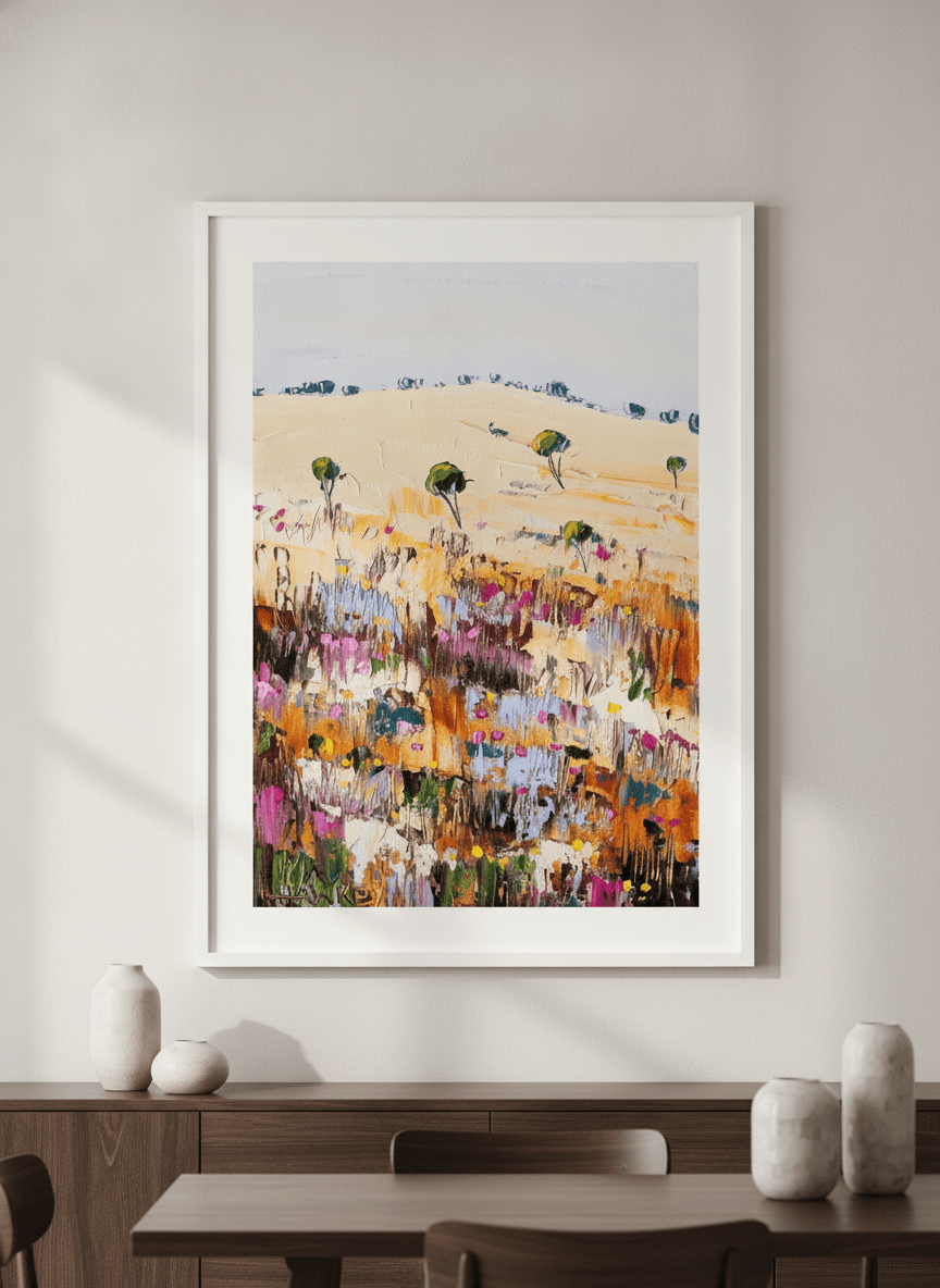 Wall art styled above a dining table in a contemporary home