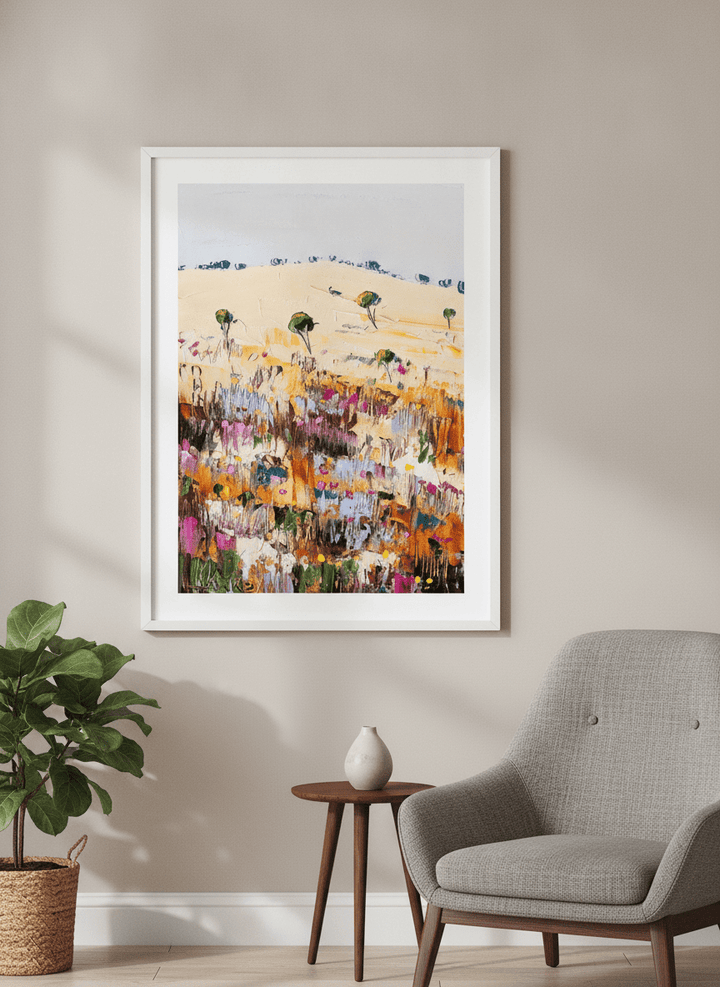 Modern wall art styled above a sofa in a neutral living room