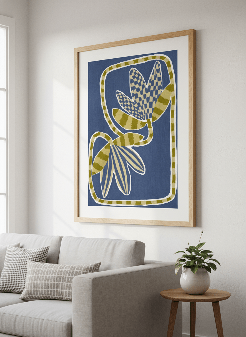 Modern wall art styled above a sofa in a neutral living room