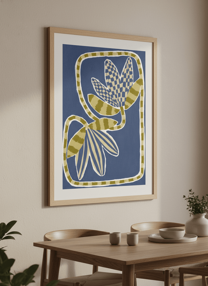 Wall art styled above a dining table in a contemporary home