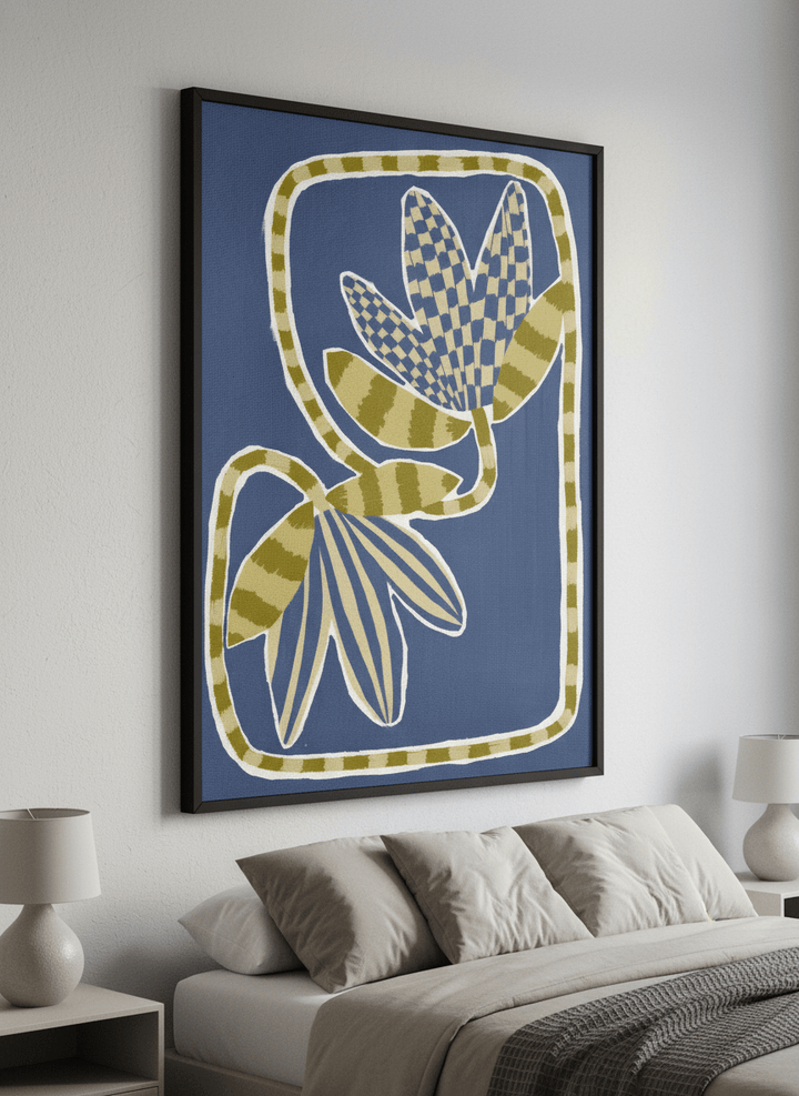 Minimalist artwork displayed in a calm, light-filled bedroom interior