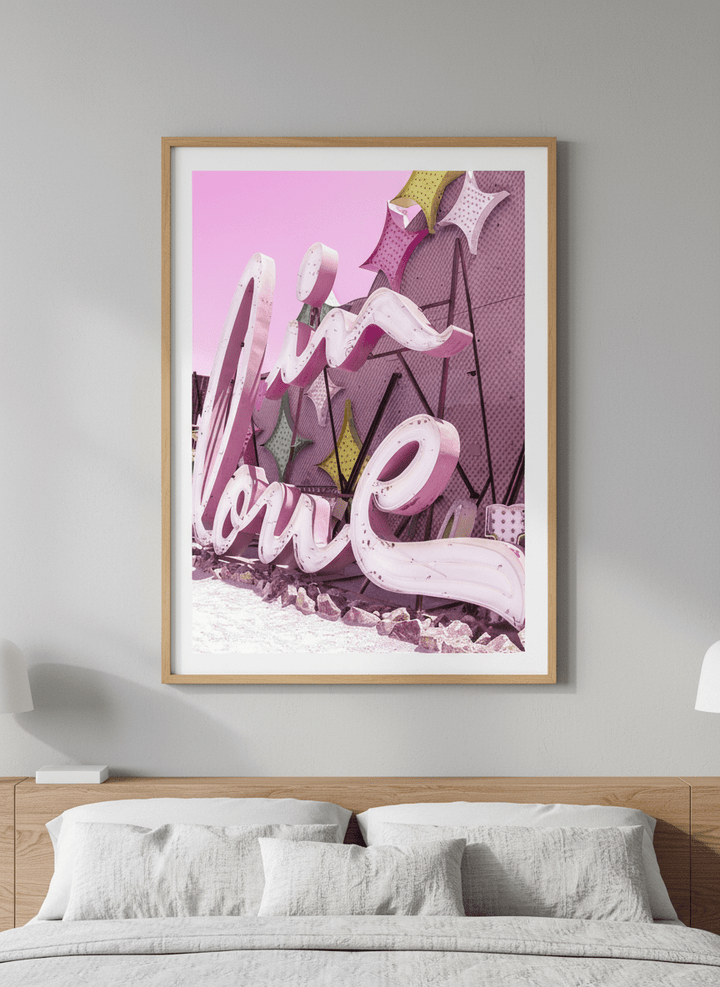 Minimalist artwork displayed in a calm, light-filled bedroom interior