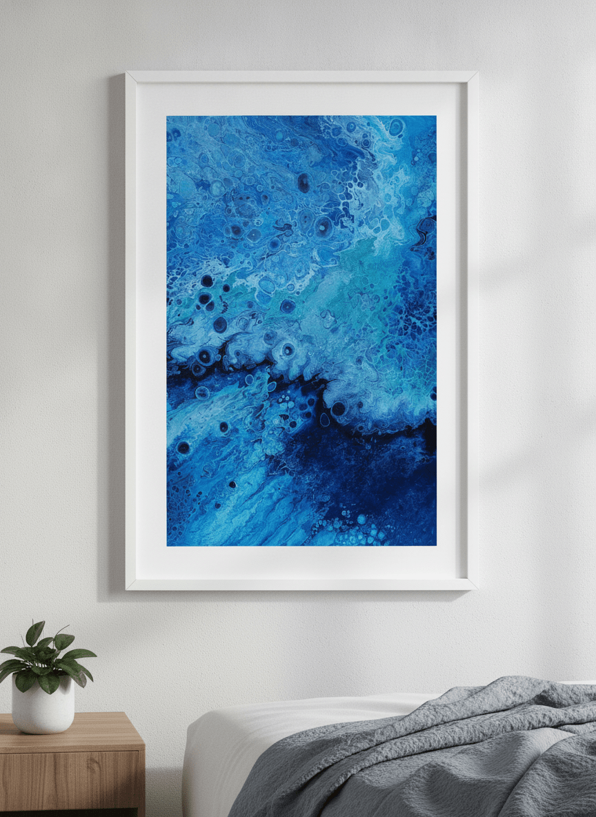 Minimalist artwork displayed in a calm, light-filled bedroom interior