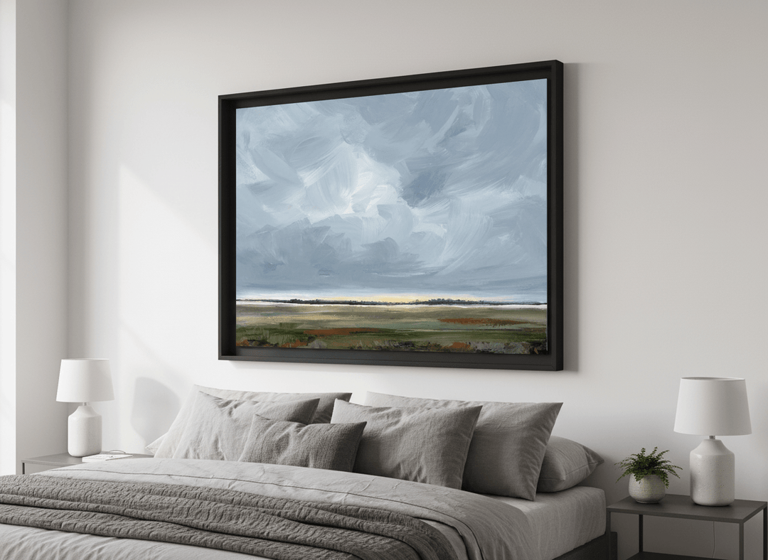 Minimalist artwork displayed in a calm, light-filled bedroom interior
