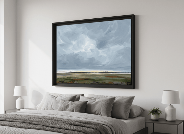 Minimalist artwork displayed in a calm, light-filled bedroom interior
