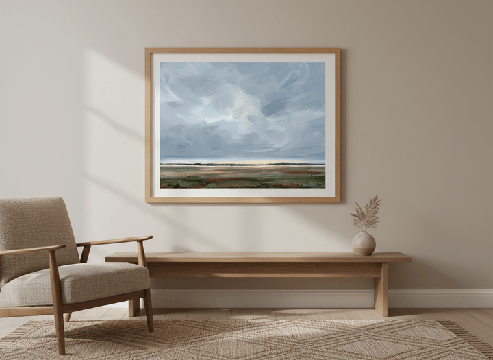 Modern wall art styled above a sofa in a neutral living room