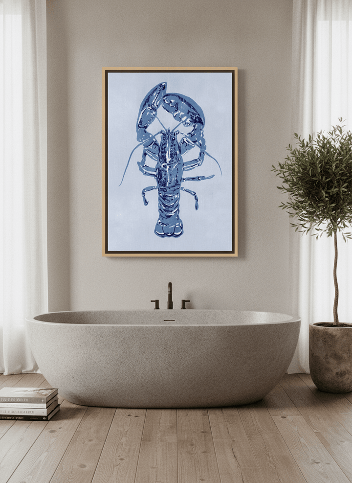 Canvas wall art with a natural timber surround styled on the wall in a luxe bathroom