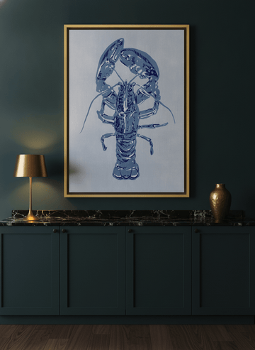 Canvas wall art with a gold leaf surround styled on the wall in a moody kitchen