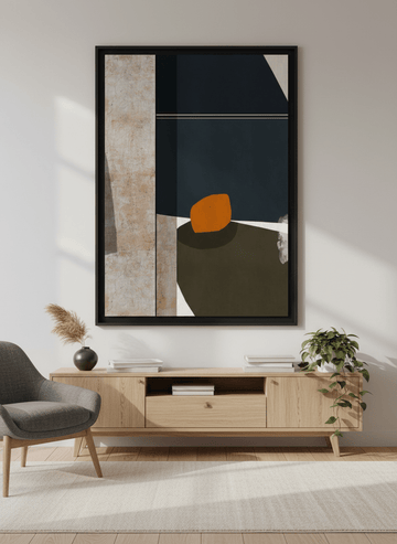 Modern wall art styled above a sofa in a neutral living room