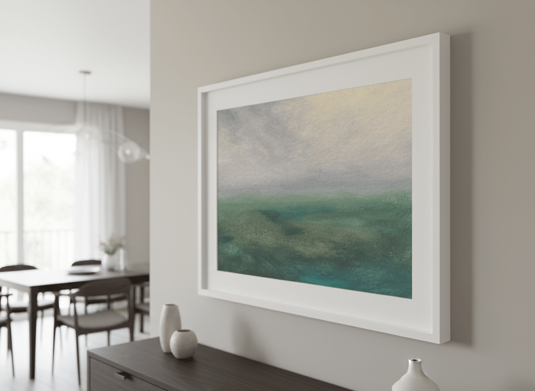 Wall art styled above a dining table in a contemporary home