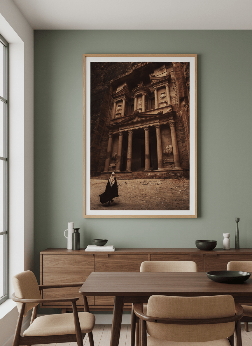 Wall art styled above a dining table in a contemporary home