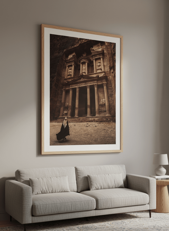 Modern wall art styled above a sofa in a neutral living room