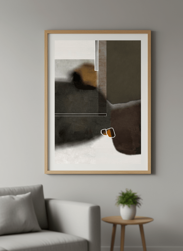 Modern wall art styled above a sofa in a neutral living room