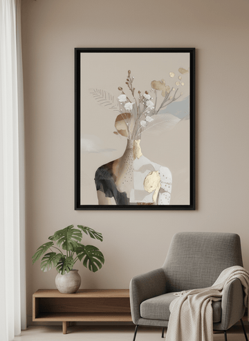 Modern wall art styled above a sofa in a neutral living room