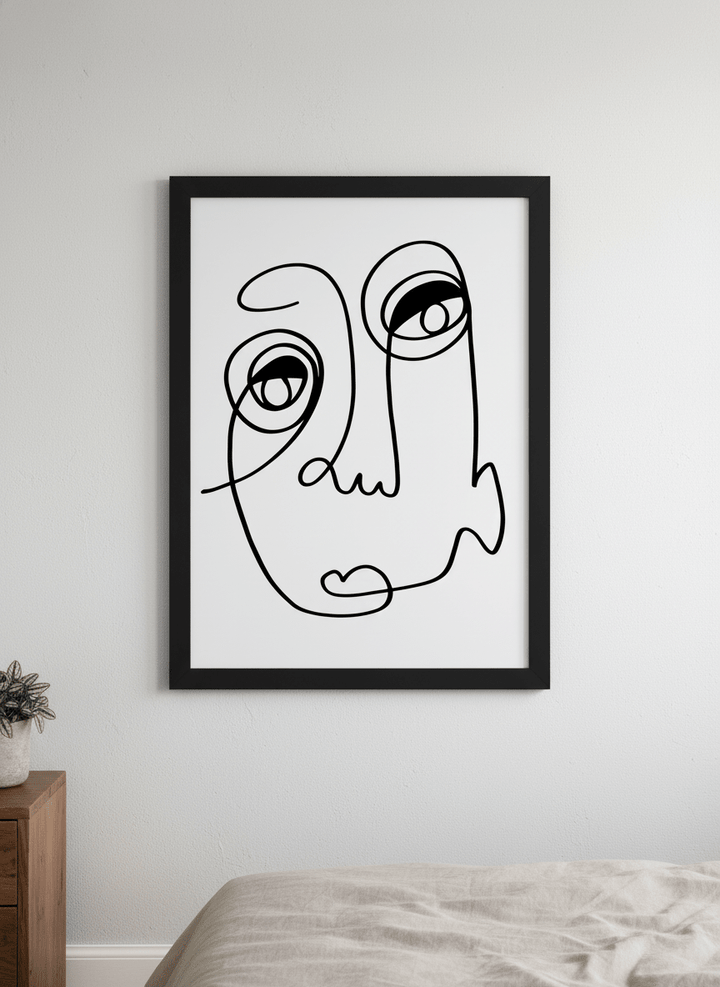 Minimalist artwork displayed in a calm, light-filled bedroom interior