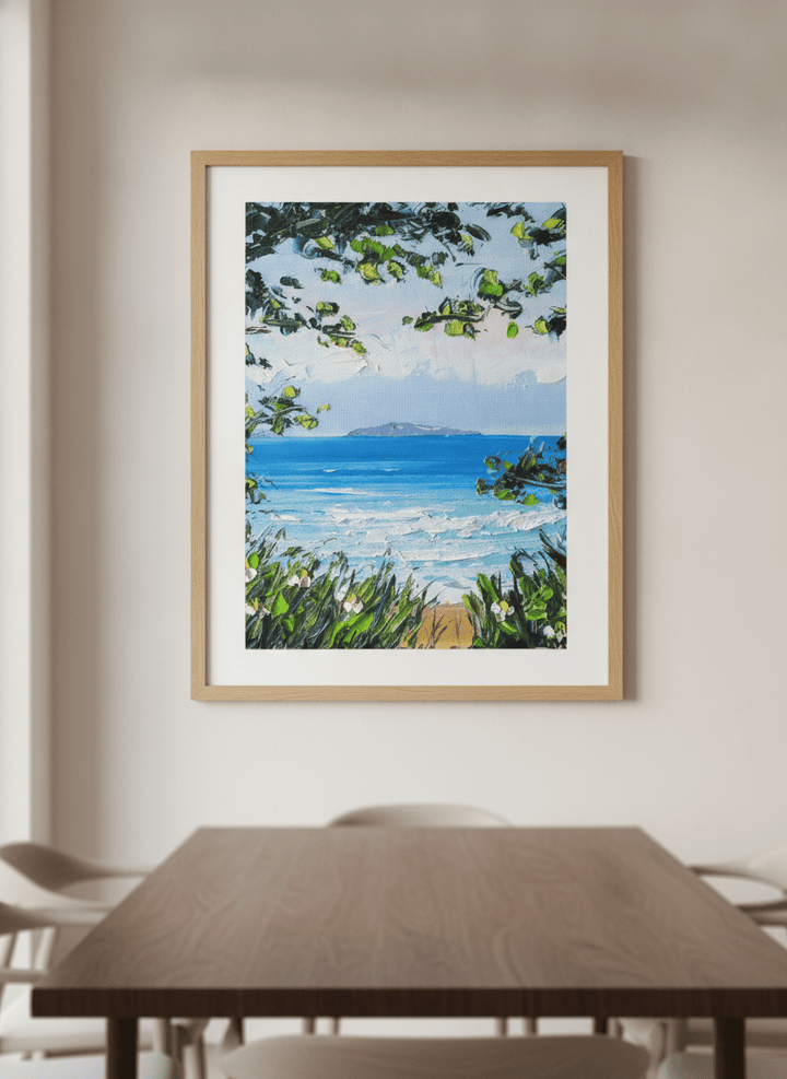 Wall art styled above a dining table in a contemporary home