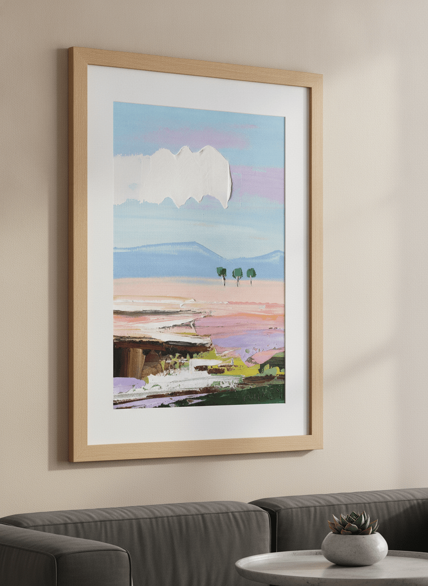 Modern wall art styled above a sofa in a neutral living room