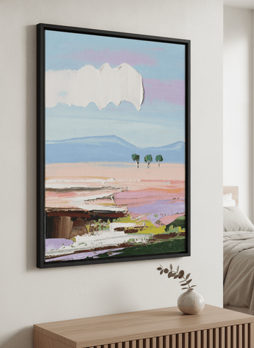 Minimalist artwork displayed in a calm, light-filled bedroom interior
