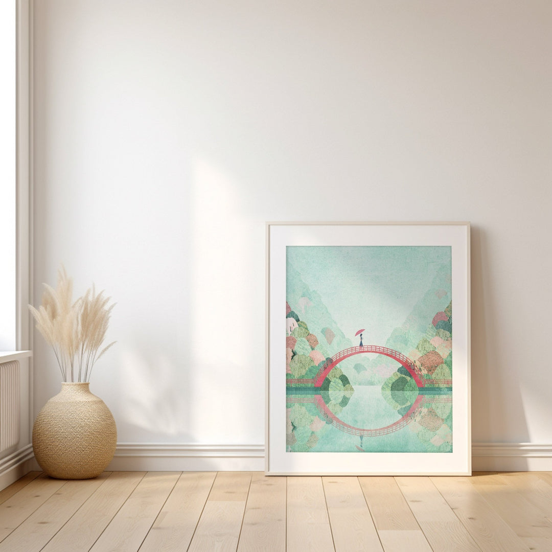 artwork of a bridge over water with floral elements on a white wall.