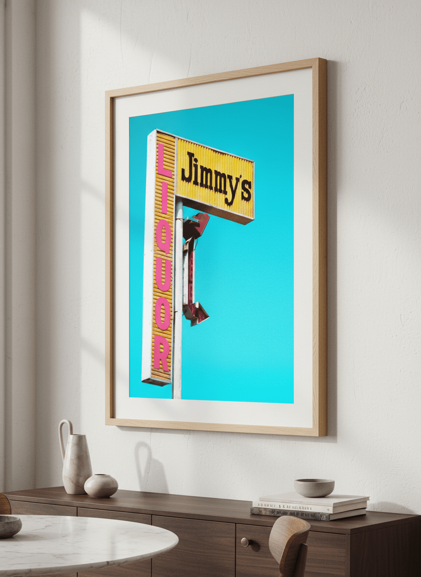 Wall art styled above a dining table in a contemporary home