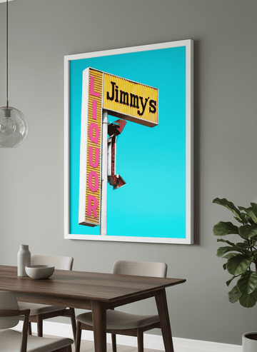 Wall art styled above a dining table in a contemporary home