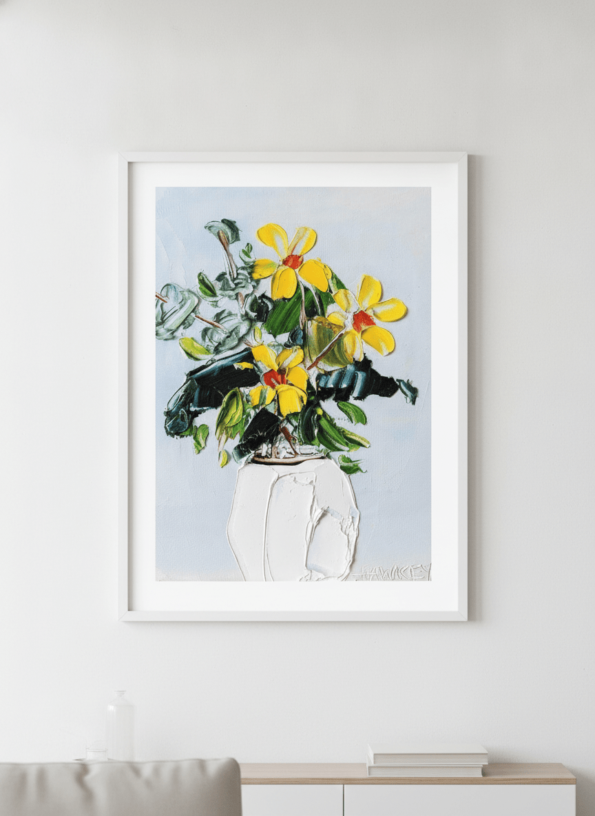 Modern wall art styled above a sofa in a neutral living room