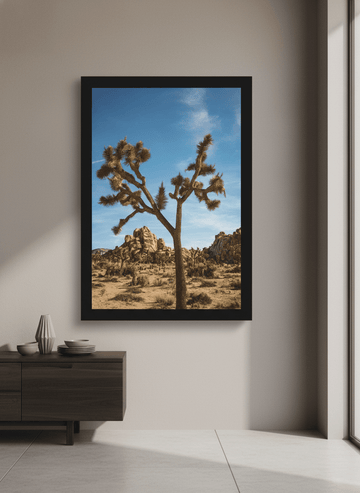 Wall art styled above a dining table in a contemporary home