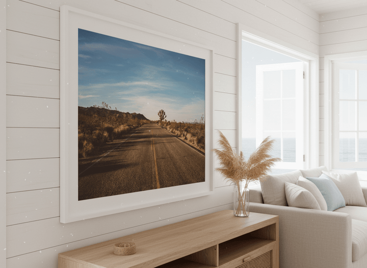 Neutral wall art displayed in a sunny coastal beach house