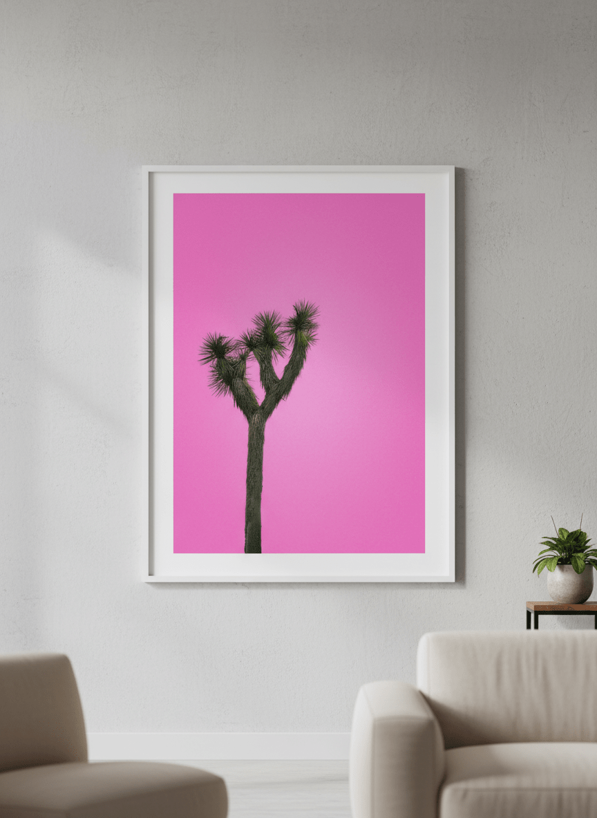 Modern wall art styled above a sofa in a neutral living room