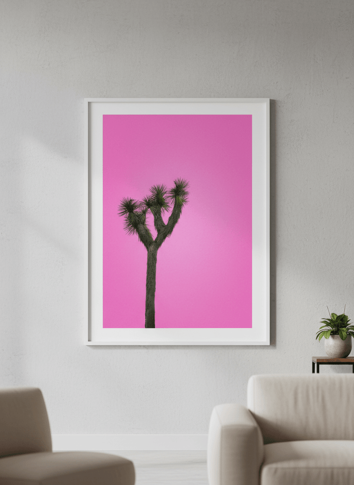 Modern wall art styled above a sofa in a neutral living room