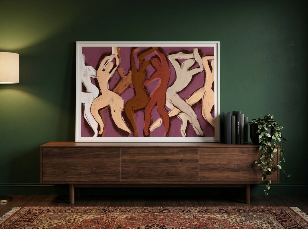 Modern wall art print standing on a sideboard in a moody home office