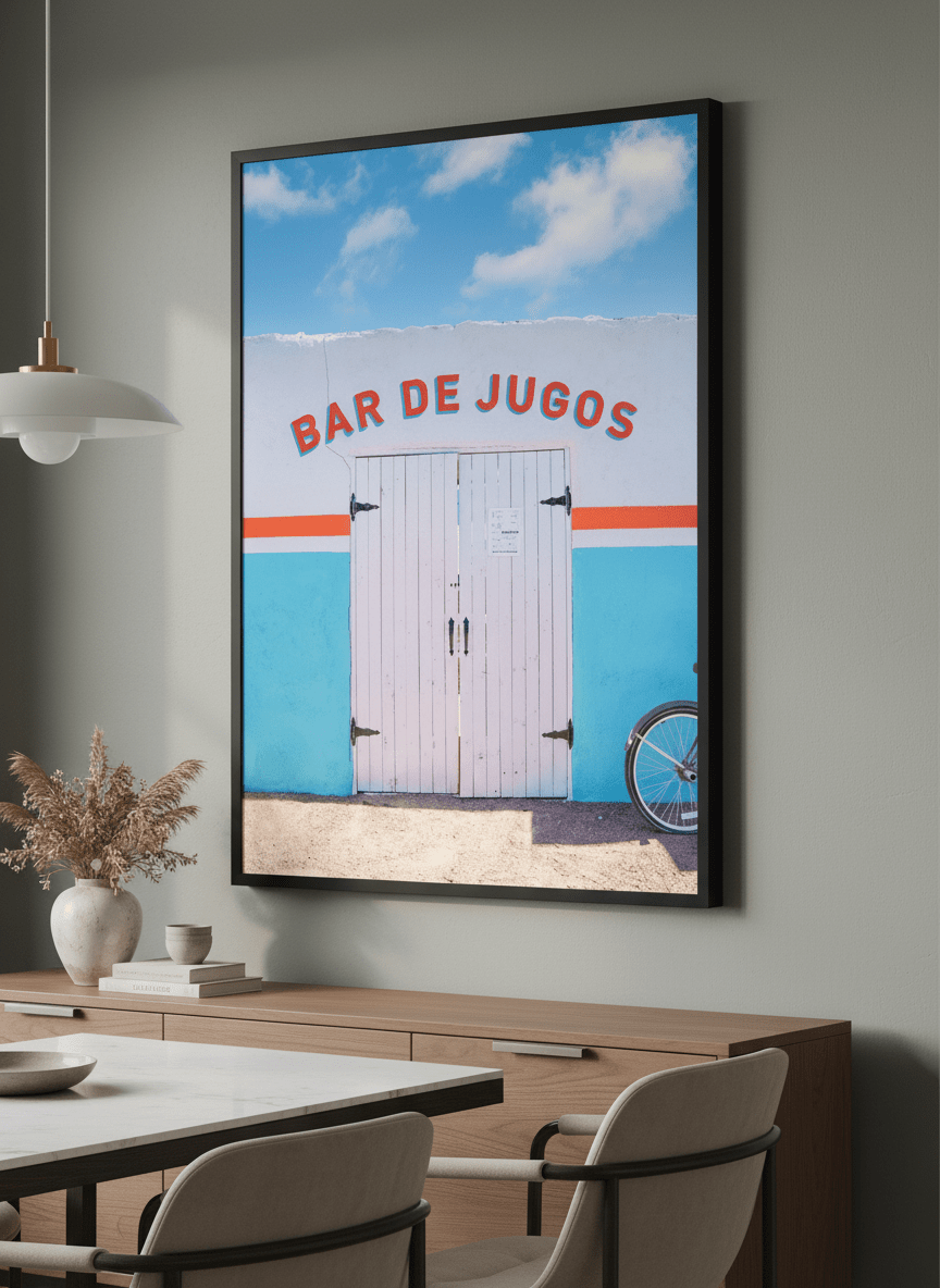 Wall art styled above a dining table in a contemporary home