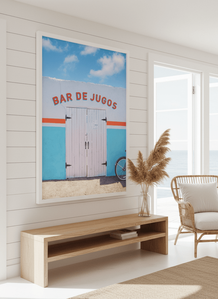 Neutral wall art displayed in a sunny coastal beach house