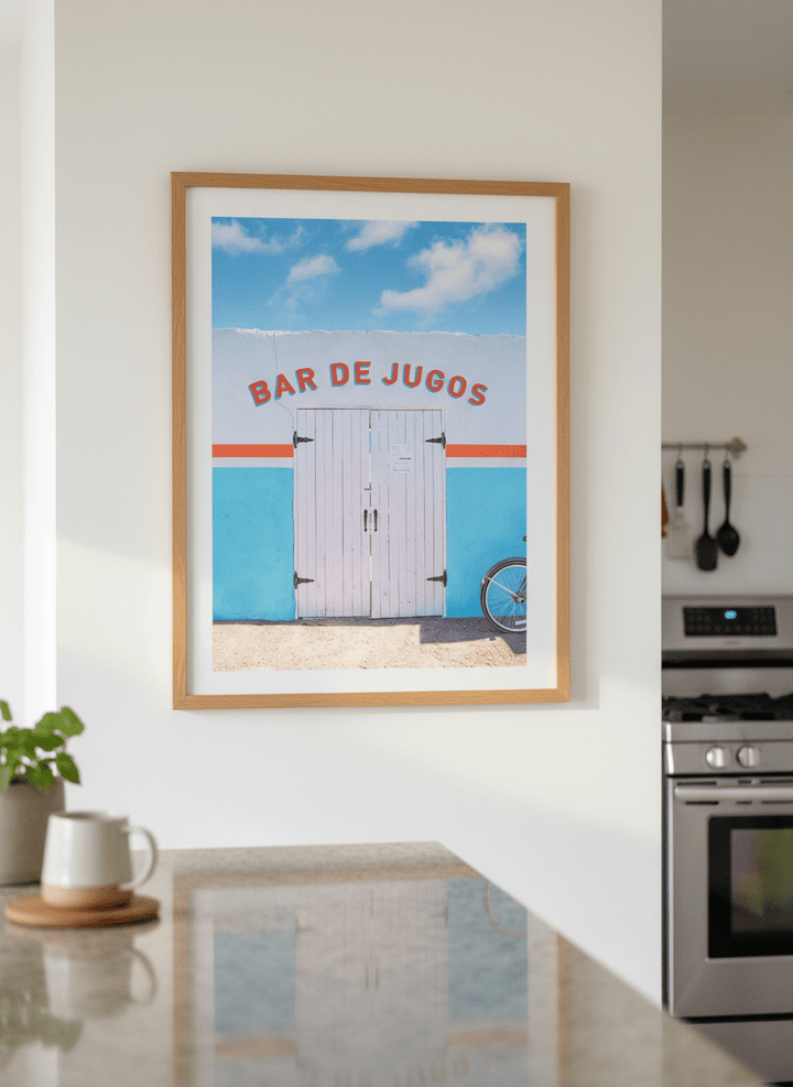 Artwork styled on the wall of a bright modern kitchen