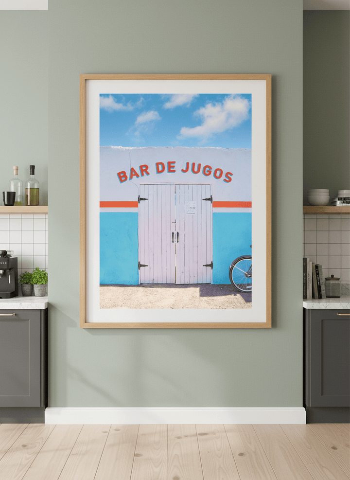 Artwork styled on the wall of a bright modern kitchen