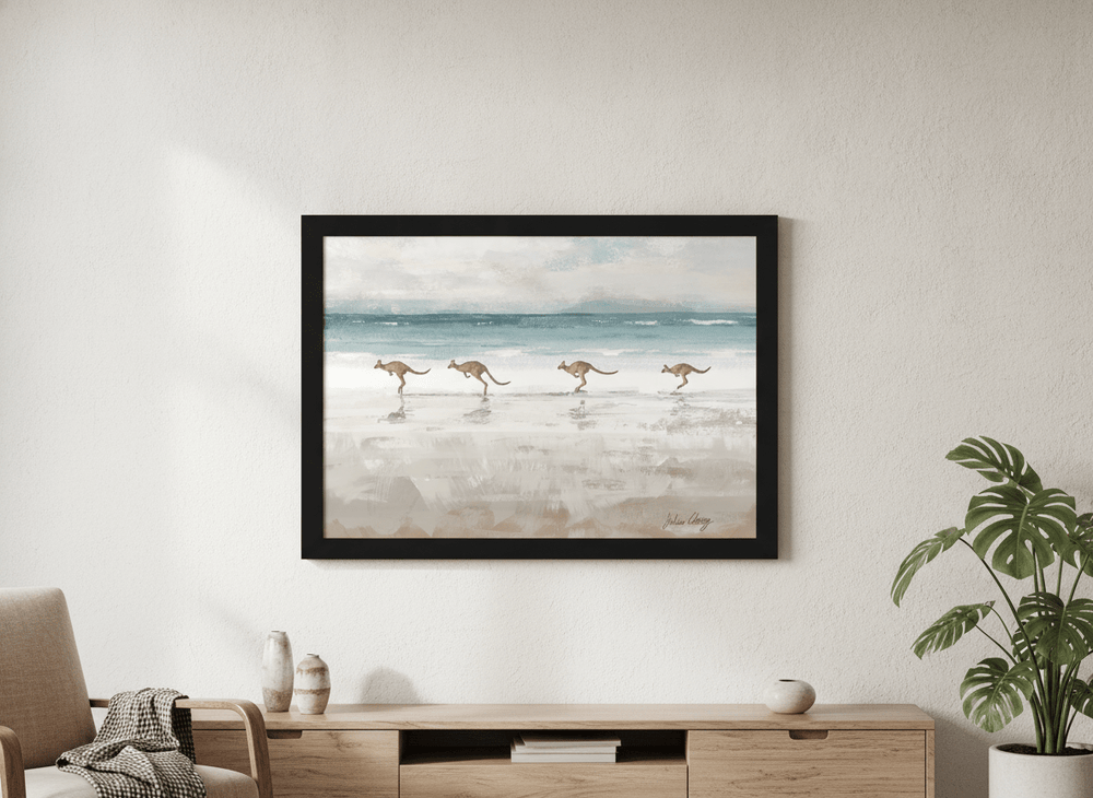 Modern wall art styled above a sofa in a neutral living room