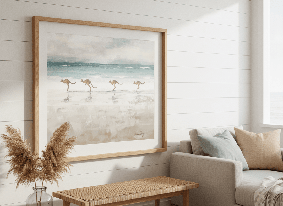 Neutral wall art displayed in a sunny coastal beach house