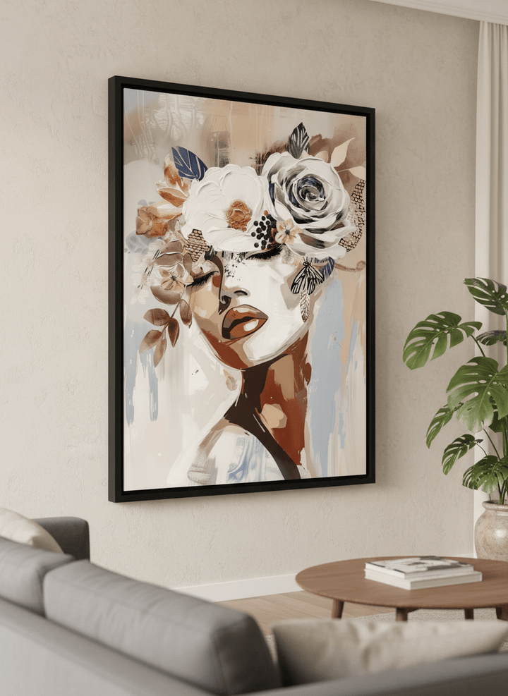 Modern wall art styled above a sofa in a neutral living room
