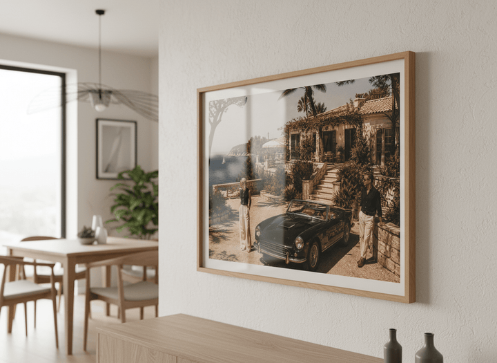 Wall art styled above a dining table in a contemporary home